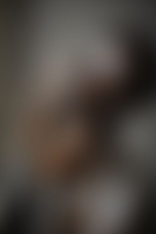 A sexy photograph of Cam Damage in transparent latex. Posted July 2021.