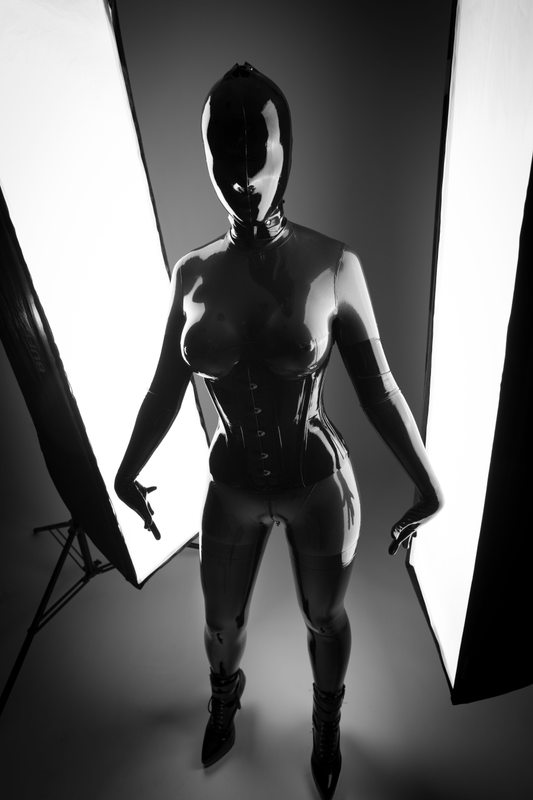 A sexy photograph of Vespa, in metallic latex. Posted January 2016.