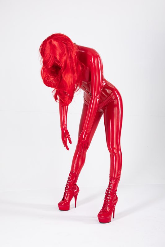 A sexy photograph of Kinki Venus in red latex. Posted November 2018.