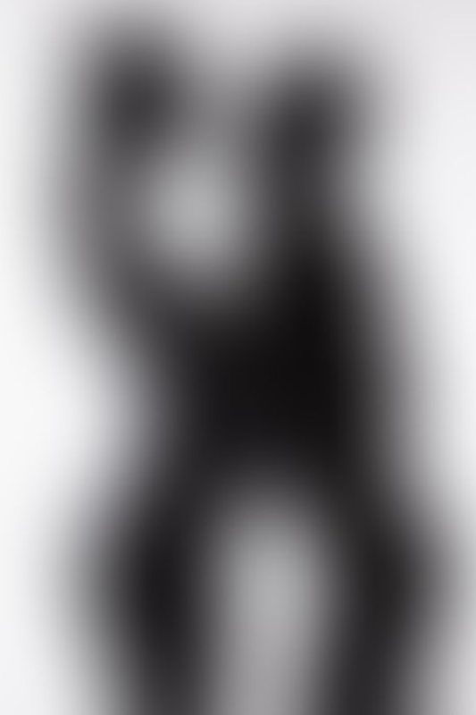 A sexy photograph of Cam Damage &amp; Vespa in black latex. Posted January 2018.