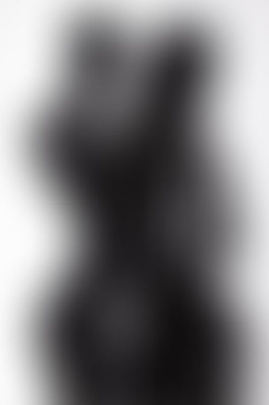 A sexy photograph of Cam Damage &amp; Vespa in black latex. Posted January 2018.