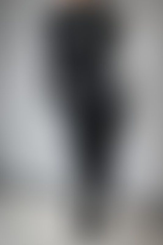 A sexy photograph of Miss Chill in black latex. Posted November 2022.