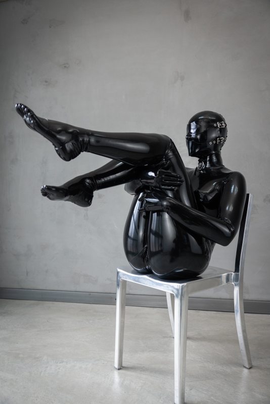 A sexy photograph of Miss Chill in black latex. Posted November 2022.