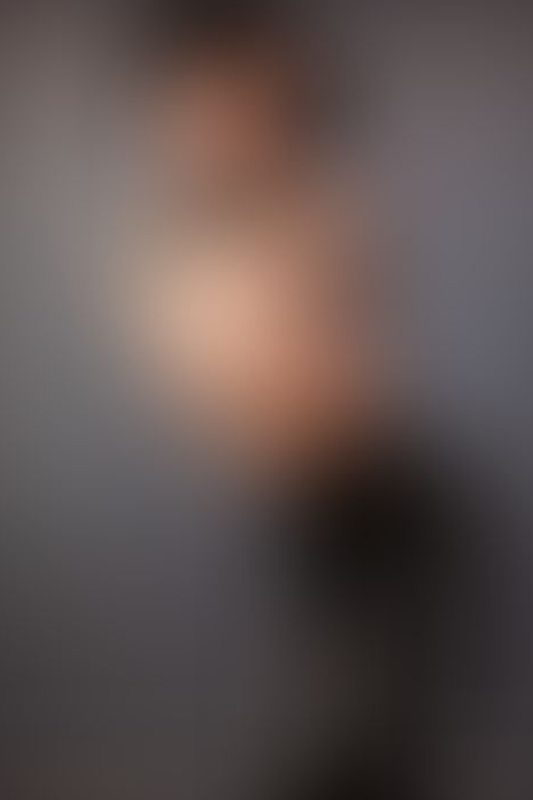 A sexy photograph of Shweetie showing bare skin with black latex. Tagged with: armbinder. Posted September 2021.