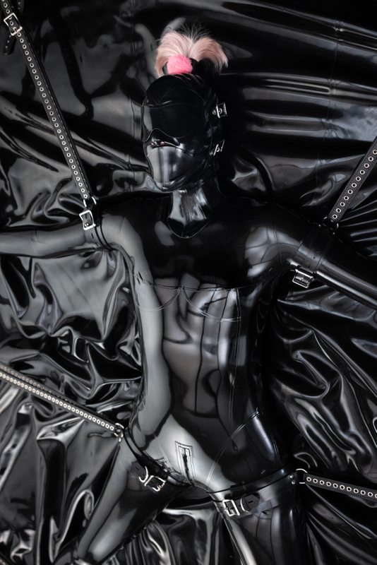 A sexy photograph of Dot in black latex. Tagged with: bondage. Posted June 2016.