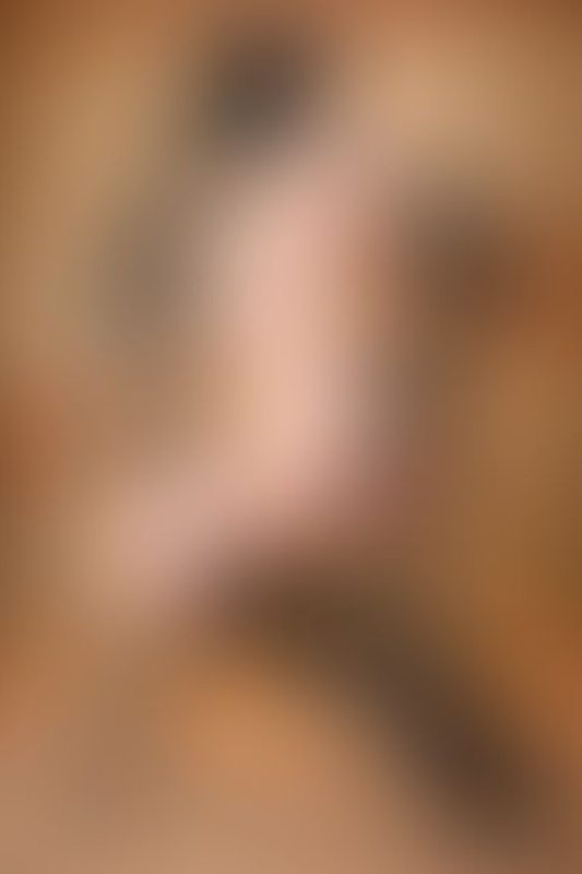 A sexy photograph of Skin & Sin showing bare skin with black latex. Posted October 2018.