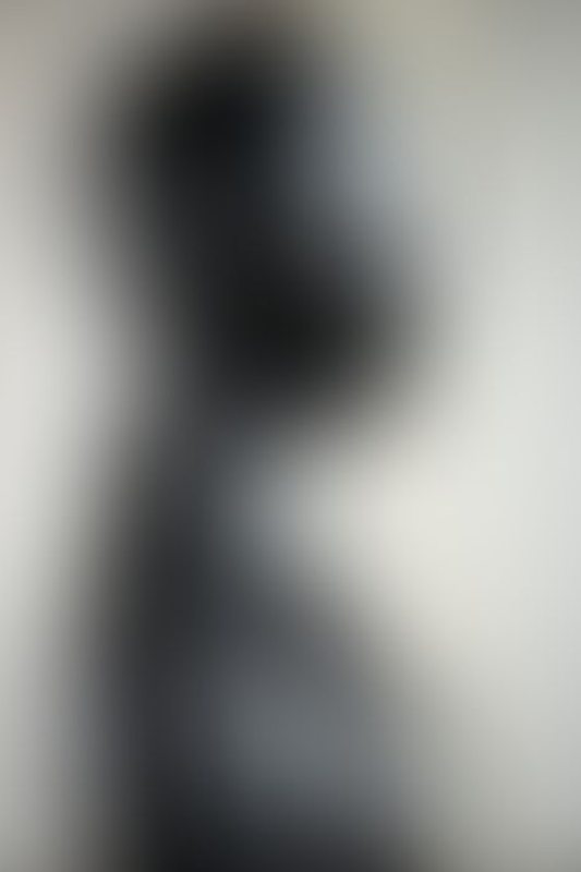 A sexy photograph of Mbot in black latex. Posted September 2019.