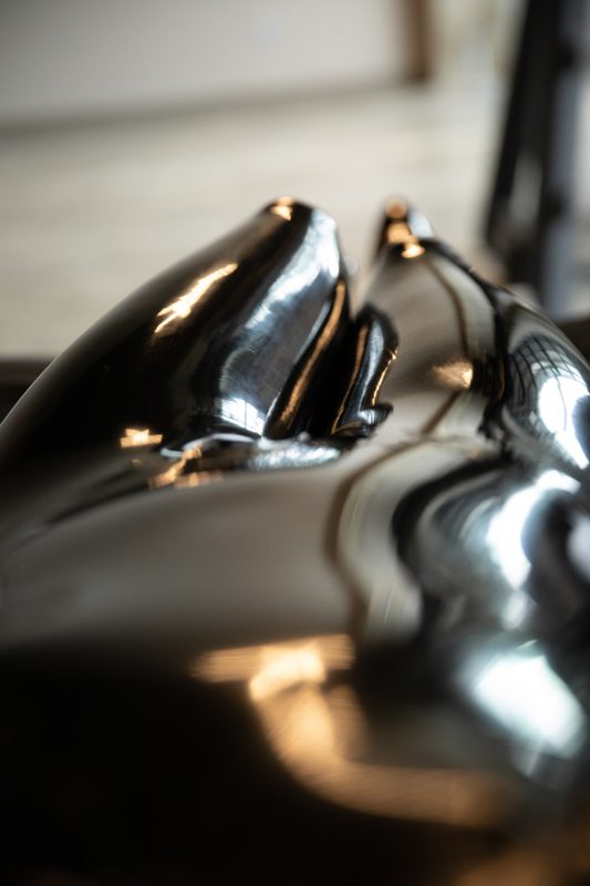 A sexy photograph of Mbot in black latex. Posted September 2019.