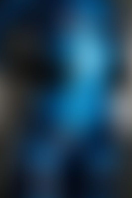 A sexy photograph of Vespa in transparent &amp; blue latex. Posted December 2016.