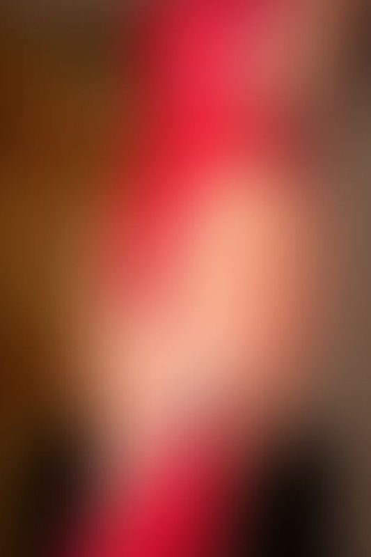 A sexy photograph of Vespa in red &amp; transparent latex. Posted June 2018.
