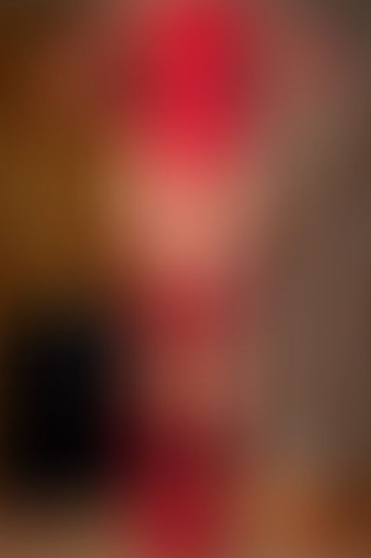 A sexy photograph of Vespa in red &amp; transparent latex. Posted June 2018.