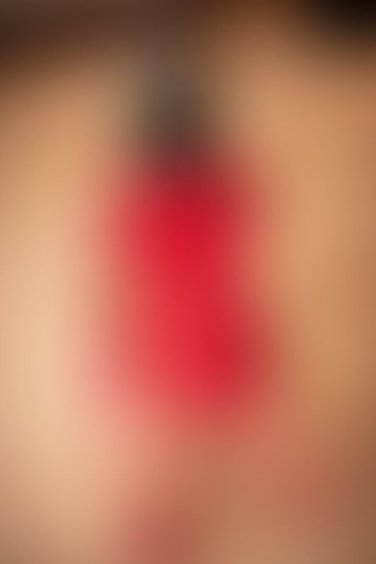 A sexy photograph of Vespa in red &amp; transparent latex. Tagged with: gasmask. Posted June 2018.
