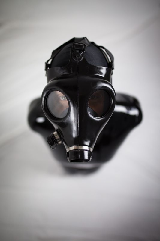 A sexy photograph of Vespa in black latex. Tagged with: gasmask. Posted December 2014.