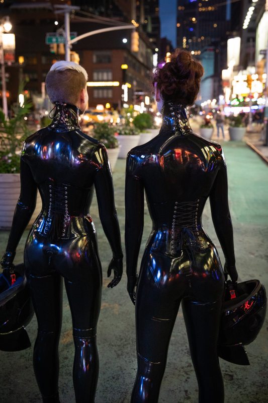 A sexy photograph of Cam Damage & Vespa in black latex. Tagged with: in public & space kitten. Posted April 2020.