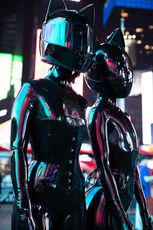 A sexy photograph of Cam Damage & Vespa in black latex. Tagged with: in public, space kitten & moto helmet. Posted March 2020.
