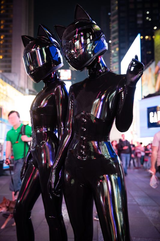 A sexy photograph of Cam Damage & Vespa in black latex. Tagged with: in public, space kitten & moto helmet. Posted March 2020.