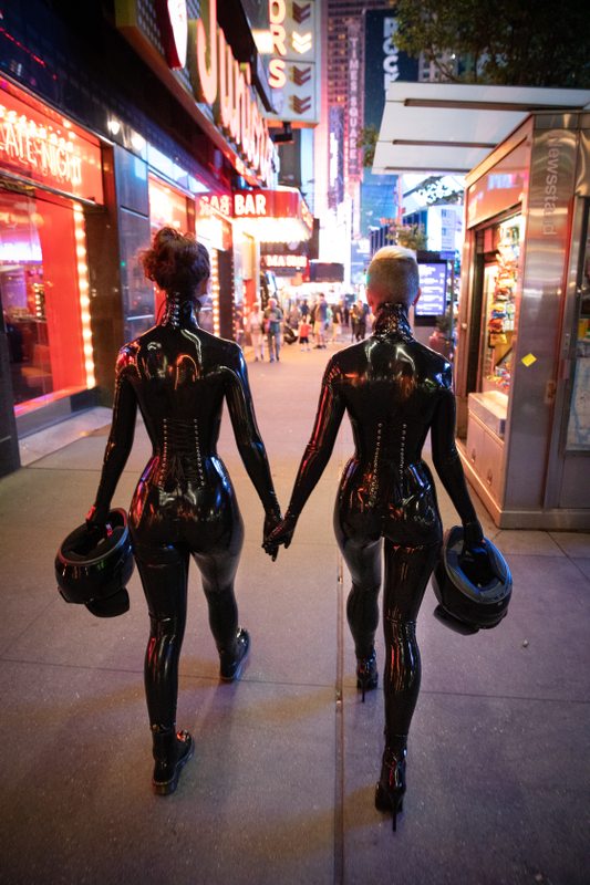 A sexy photograph of Cam Damage & Vespa in black latex. Tagged with: in public & space kitten. Posted April 2020.
