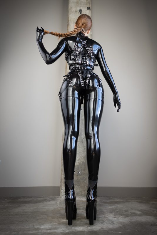 A sexy photograph of Mbot in black latex. Posted July 2021.