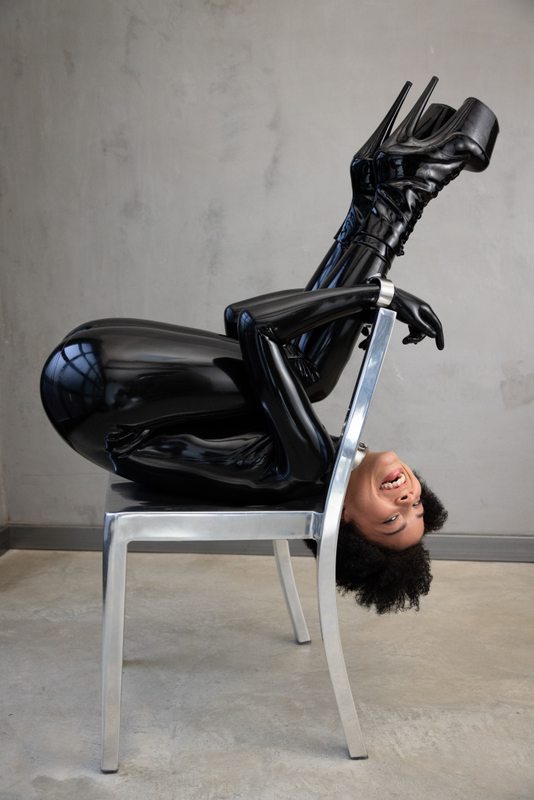 A sexy photograph of Shweetie, in black latex. Posted November 2021.