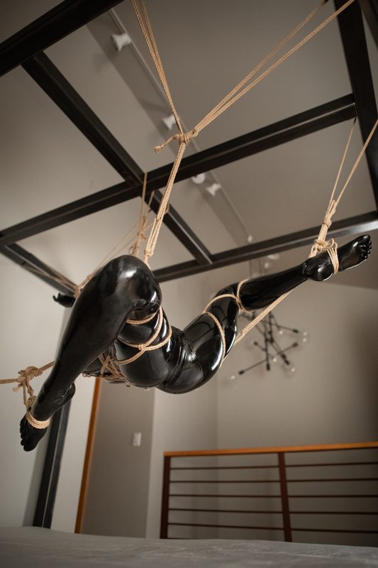 A sexy photograph of Vespa in black latex. Tagged with: rope / shibari. Posted December 2018.