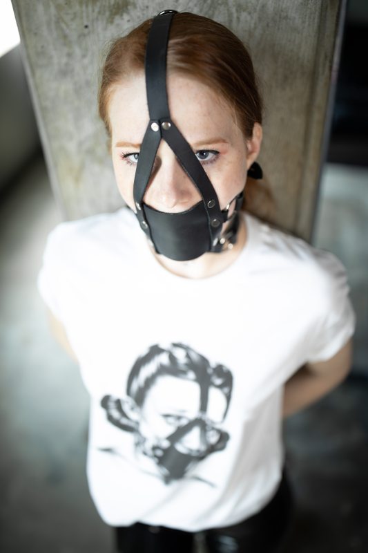 A sexy photograph of MbotTagged with: muzzle & gagged. Posted October 2019.