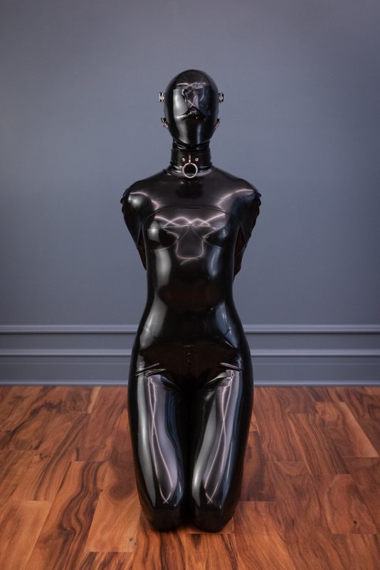 A sexy photograph of Vespa in black latex. Posted December 2021.