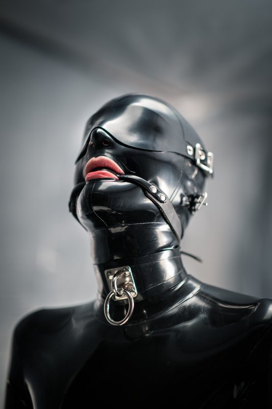 A sexy photograph of black latex. Posted January 2018.
