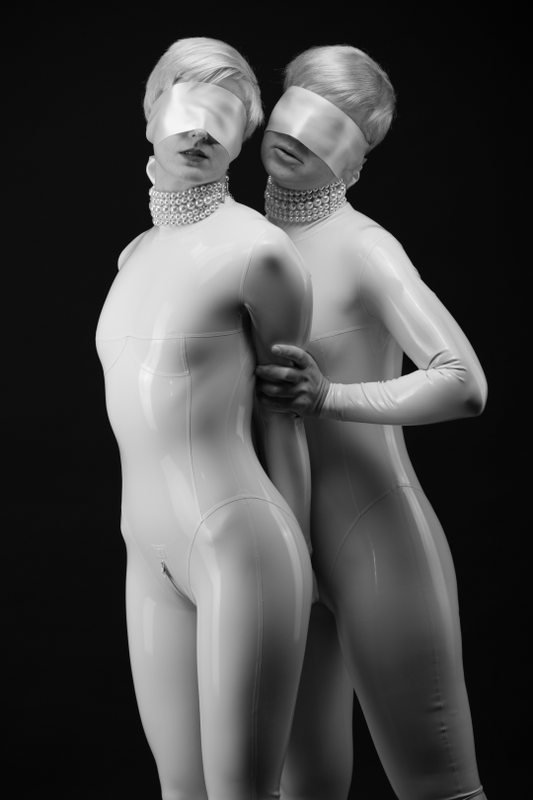 A sexy photograph of Vespa & Nico, in white latex. Posted May 2017.