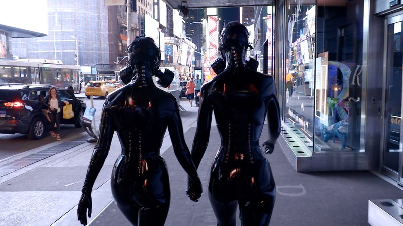 A sexy video of Vespa & Cam Damage in black latex. Tagged with: gasmask, in public, corset & neck corset. Posted April 2020.
