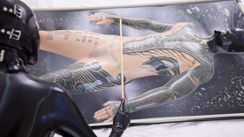 A sexy video of Vespa &amp; Cam Damage in black &amp; transparent latex. Tagged with: impact, vacbed &amp; tattoos. Posted July 2025.